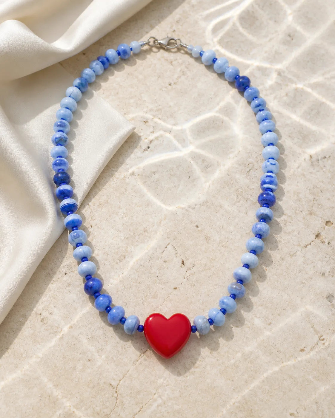 Corazón blue rondelle, handmade glass jewelry by Parcha